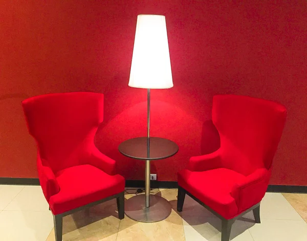 red sofa couch and popcorn in cinema