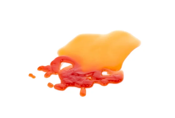 Spruzzi di ketchup rosso isolati su sfondo bianco — Foto Stock