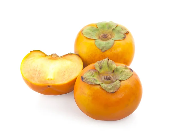 Persimmon aux fruits tropicaux. Kaki avec des feuilles sur fond blanc — Photo