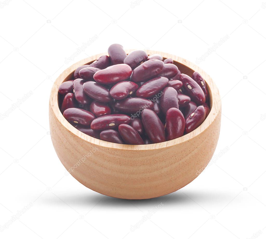 Haricot beans in brown wooden bowl isolated on white background 