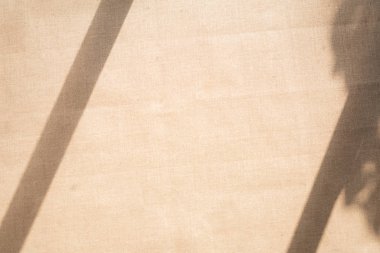 Keten kumaş doku veya arka plan, kahverengi renk ve gölge