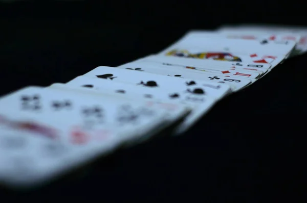 playing cards on black background