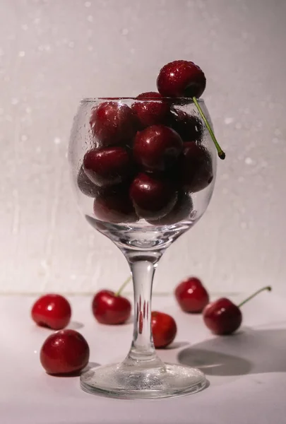 red sweet cherry in a glass
