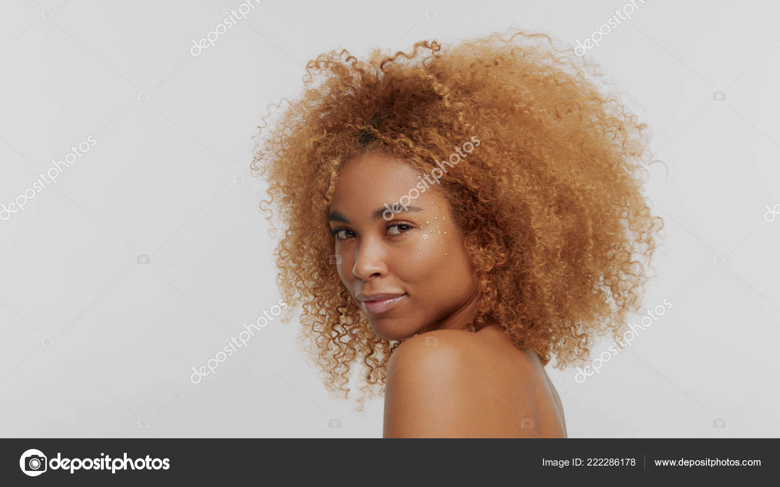 Mixed Race Black Blonde Model With Curly Hair Stock Photo