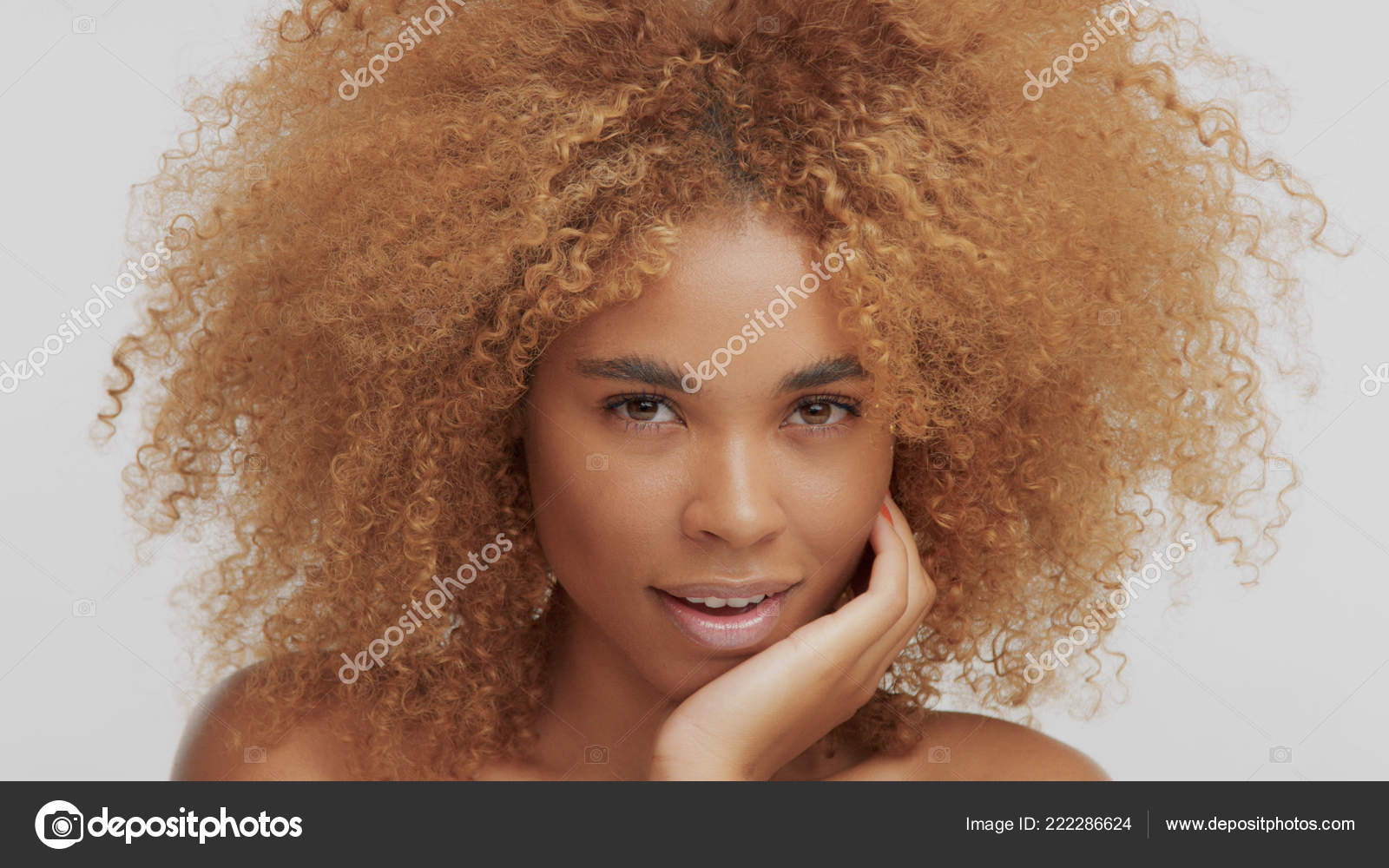 Mixed Race Black Blonde Model With Curly Hair Stock Photo