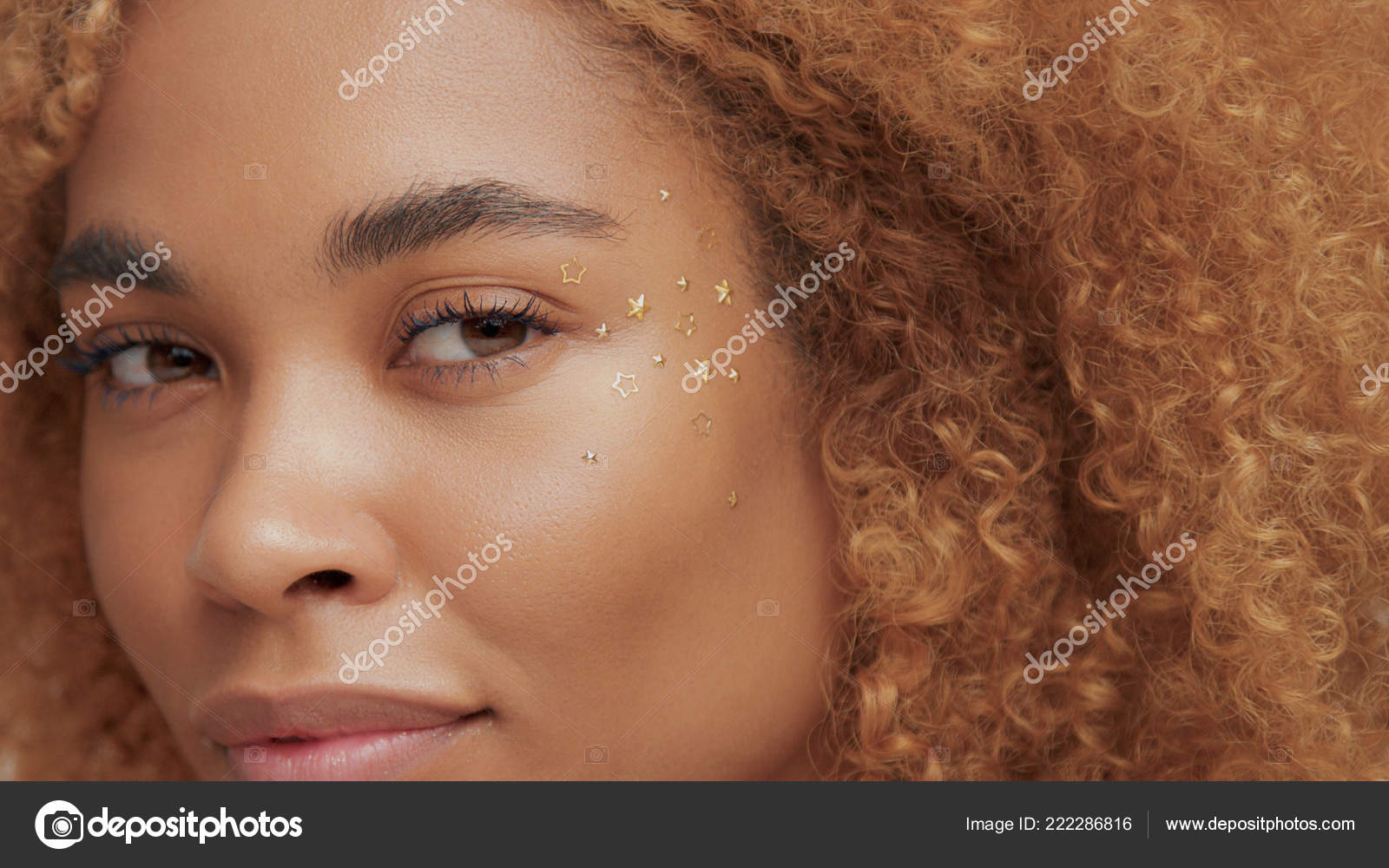 Mixed Race Black Blonde Model With Curly Hair Stock Photo