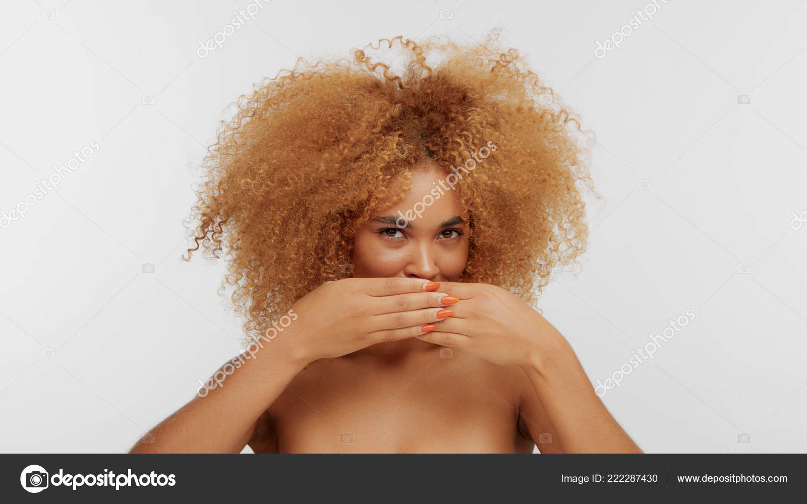 Mixed Race Black Blonde Model With Curly Hair Stock Photo