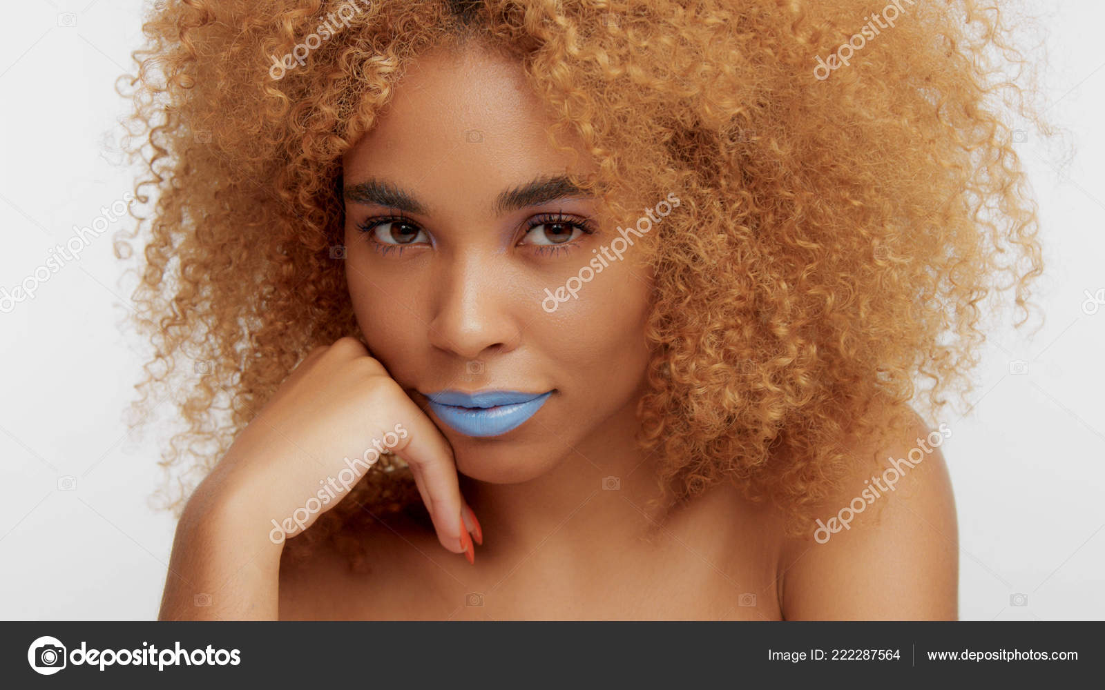 Mixed Race Black Blonde Model With Curly Hair Stock Photo