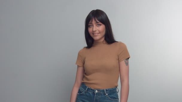 MIxed race brunette woman with blue eyes in studio — Stock Video