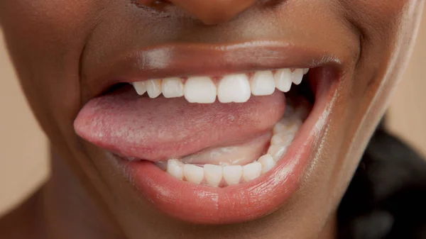 Closeup of mouth of black mixed race woman — Stock Photo, Image