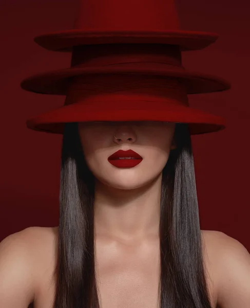 Woman with strong red lips and hats cover half of her face — Stock Photo, Image