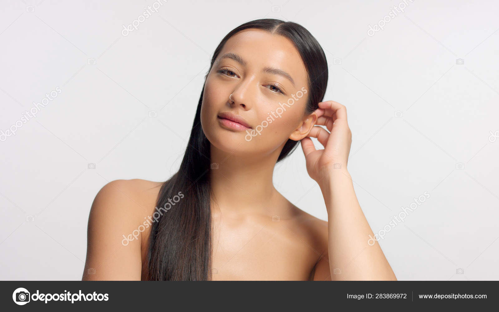Mixed race asian model in studio beauty shoot Stock Photo by ©kazzakova