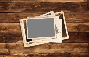 Eski fotoğraflar ahşap arka plan üzerinde kazık