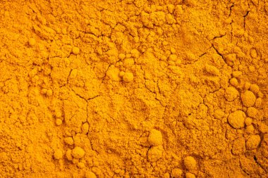 Curcuma (Curcuma longa) toz arka plan