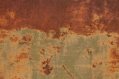 Paslı sarı-kırmızı desenli metal yüzey. Metal levhanın dokusu oksitlenme ve aşınmaya eğilimlidir. Grunge Biçiminde Dokulu Arkaplan