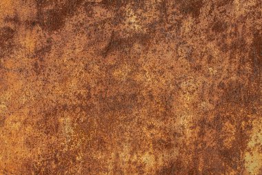Paslı sarı-kırmızı desenli metal yüzey. Metal levhanın dokusu oksitlenme ve aşınmaya eğilimlidir. Grunge Biçiminde Dokulu Arkaplan