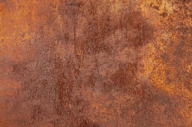 Paslı sarı-kırmızı desenli metal yüzey. Metal levhanın dokusu oksitlenme ve aşınmaya eğilimlidir. Grunge Biçiminde Dokulu Arkaplan