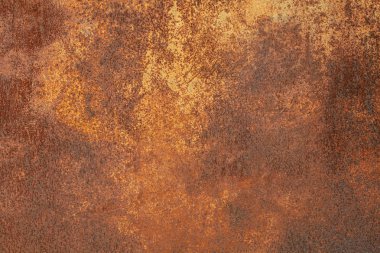 Paslı sarı-kırmızı desenli metal yüzey. Metal levhanın dokusu oksitlenme ve aşınmaya eğilimlidir. Grunge Biçiminde Dokulu Arkaplan