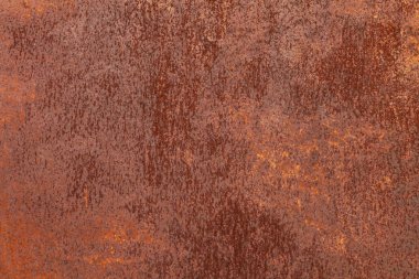 Paslı sarı-kırmızı desenli metal yüzey. Metal levhanın dokusu oksitlenme ve aşınmaya eğilimlidir. Grunge Biçiminde Dokulu Arkaplan