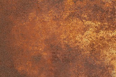 Paslı sarı-kırmızı desenli metal yüzey. Metal levhanın dokusu oksitlenme ve aşınmaya eğilimlidir. Grunge Biçiminde Dokulu Arkaplan