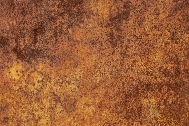 Paslı sarı-kırmızı desenli metal yüzey. Metal levhanın dokusu oksitlenme ve aşınmaya eğilimlidir. Grunge Biçiminde Dokulu Arkaplan