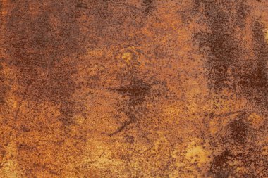 Paslı sarı-kırmızı desenli metal yüzey. Metal levhanın dokusu oksitlenme ve aşınmaya eğilimlidir. Grunge Biçiminde Dokulu Arkaplan