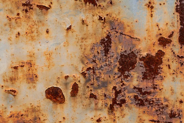 Soyut paslanmış paslı metal arka plan, paslı metal doku. Soyulmuş boya ve paslı eski metal.
