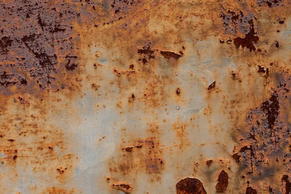 Soyut paslanmış paslı metal arka plan, paslı metal doku. Soyulmuş boya ve paslı eski metal.