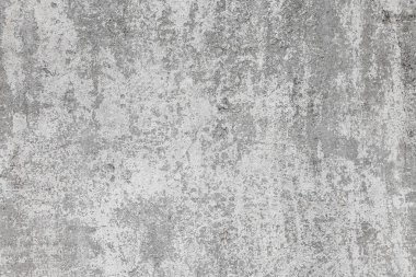Üzerinde çizikler, çatlaklar, toz, yarıklar, pürüzler ve sıva olan eski gri beton duvarın dokusu. Tasarım için poster ya da arkaplan olarak kullanılabilir