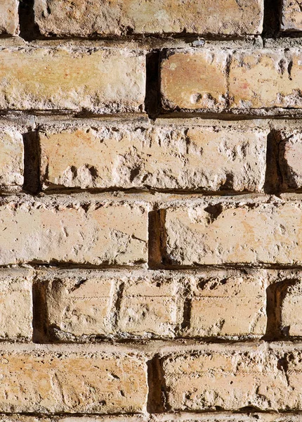 background of old brick wall in the sun