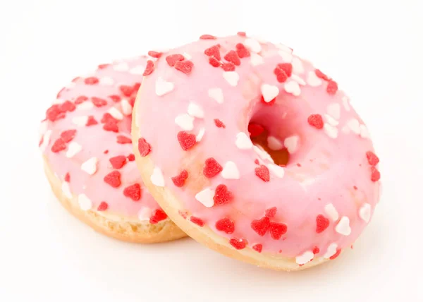 pink glazed donuts, with red hearts