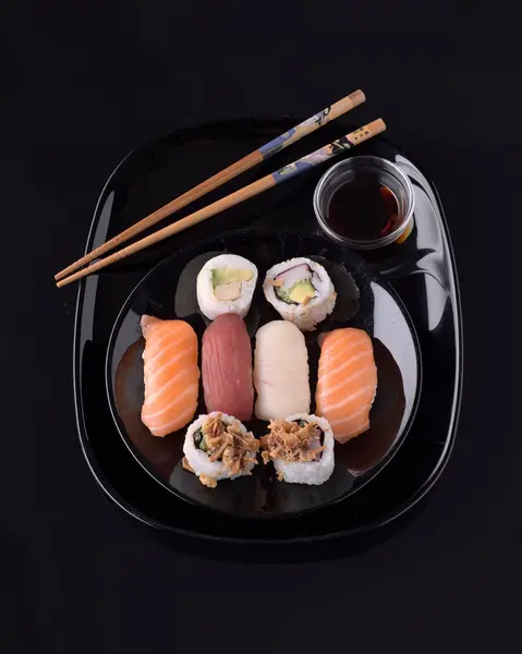 sushi on black base in shiny black porcelain