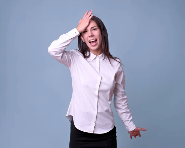 forgetful girl makes a gesture because she has forgotten somethi