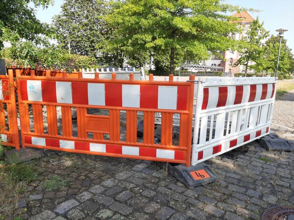 Colorful iron barrier on the road