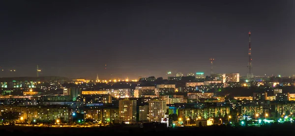 Luces de la ciudad de noche panorama, torre de televisión y templo — Foto de Stock