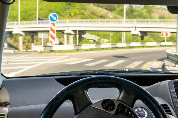 entry to a multi-level road junction located outside the city, selective focus