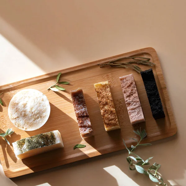 Wooden tray with handmade soap from natural ingredients.