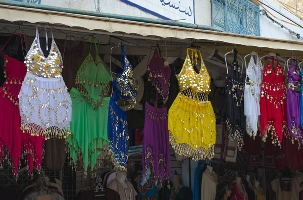 Arabic traditional clothes for belly dance being sold in Medina, traditional market in Nabeul, Tunisia