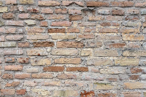Antique brickwork of a city wall. Fragment.