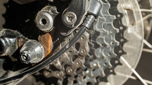 Mountain bike wheel gears closeup. Brake system. Close-up. Shifting speeds.