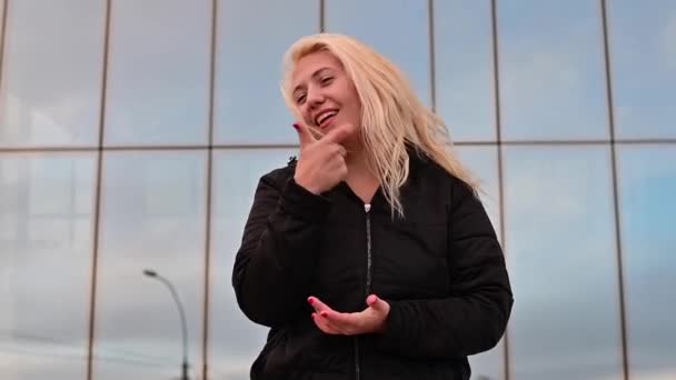 Emotional deaf and dumb woman talking sign language outdoors. — Wideo stockowe