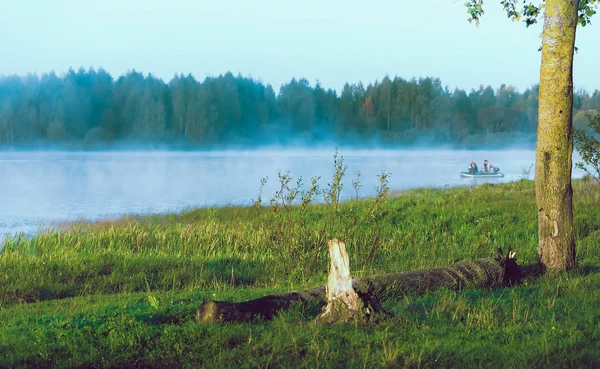 river mist and boat