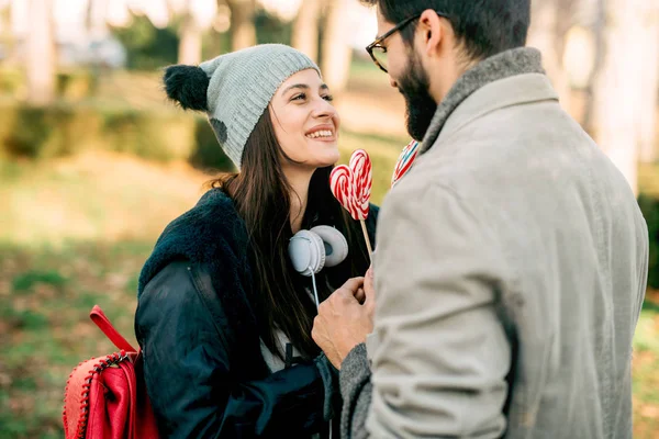 Happy Guy Girl Hold Lollipop Hand Shape Heart — Stock Photo, Image