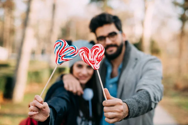 Happy Guy Girl Hold Lollipop Hand Shape Heart — Stock Photo, Image