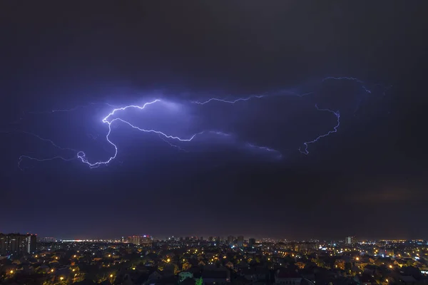 urban landscape, thunderstorm and lightning across the sky