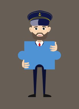 Gemi Kaptanı Pilot - Bir yapboz parçası tutuyor