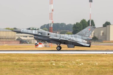 United Kingdom, Fairford - 13.7.2018 Polish F-16 demo display during the Royal International Air Tattoo in 13.07.2018 in Fairford, United Kingdom  clipart