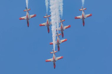 United Kingdom, Fairford - 13.7.2018 Patrouille Aguia display during the Royal International Air Tattoo in 13.07.2018 in Fairford, United Kingdom  clipart