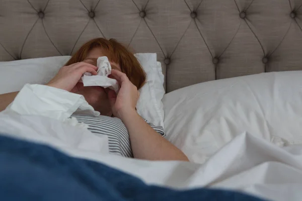 Woman Sneezing Tissue Paper Bedroom Home — Stock Photo, Image