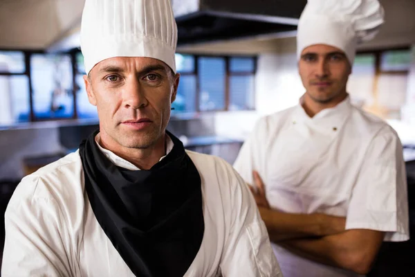 Two Male Chefs Standing Arms Crossed Kitchen Hotel — Stock Photo, Image